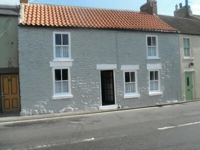 Protective coating on gable end wall